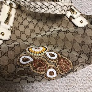 Gucci bag has some scratch outside , come with the bag,
